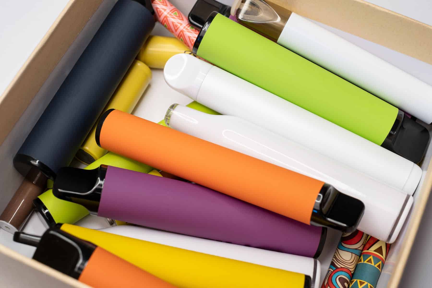 Delta-8 high-quality disposable vapes arranged in a colorful display.