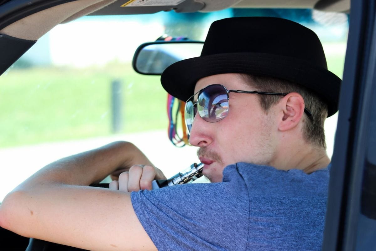 A truck driver using a CBD vape