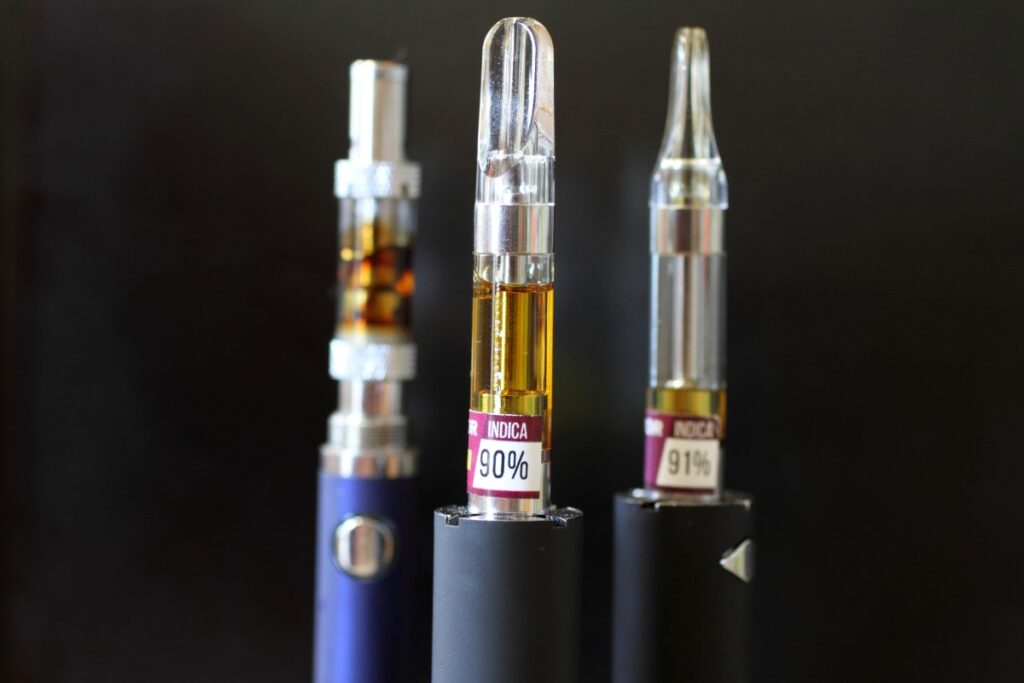 A collection of premium vape cartridges featuring different cannabis strains.